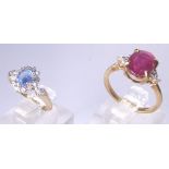 DIAMOND RINGS. 9ct Ruby and Diamond set ring size K 2.3g and a Sapphire and Diamond 9ct gold ring 1.