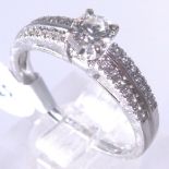 18 CT DIAMOND RING.