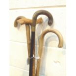 WALKING STICKS. Four mixed walking stick