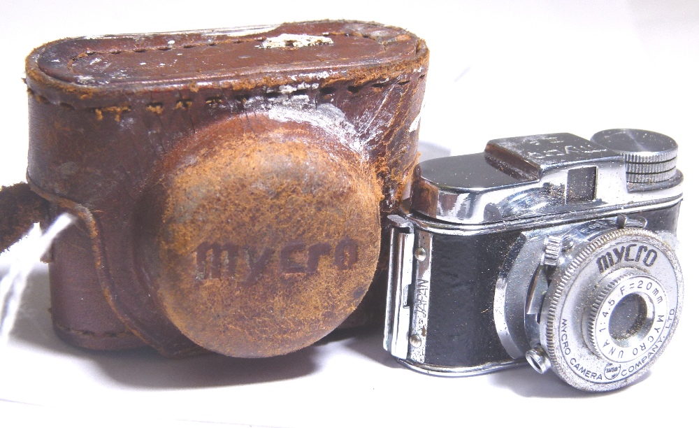 LEATHER CASED SPY CAMERA.