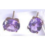 9 CT AMETHYST EARRINGS.