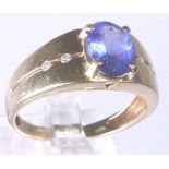 9 CT TANZANITE & DIAMOND RING. 9 K gold