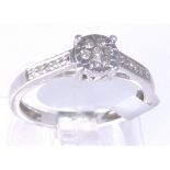 9CT CLUSTER RING. 9ct white gold diamond