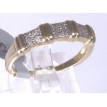 9CT BAND RING. 9ct gold twelve diamond s