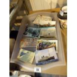 Tray of vintage postcards,