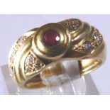 18 CT RUBY & DIAMOND RING. 18 ct yellow