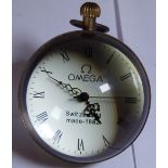 GLASS ORB CLOCK. Brass surrounded glass