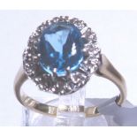 9 CT CLUSTER RING. 9 ct gold large blue