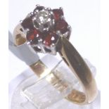 9 CT DAISY CLUSTER RING. 9 ct gold garne