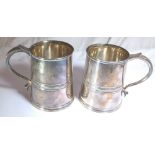 PLATED TANKARDS. Two silver plated tanka