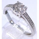 9 CT DIAMOND CLUSTER RING. 9 ct white go