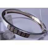 SILVER BANGLE. Sterling silver black and