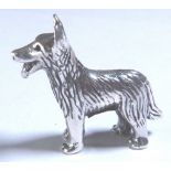 SILVER DOG. Small silver dog H: 21 mm