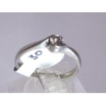 Platinum 0.15 ct diamond solitaire ring,