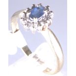 9 ct sapphire and diamond cluster ring,