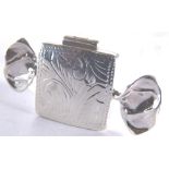 Stamped silver pill box in the form of a