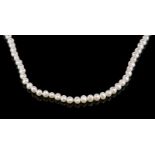 Freshwater pearl necklace, white pearls, measuring approximately 4mm in diameter, strung with some