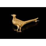 Pheasant brooch in yellow metal testing as 9ct