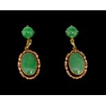 Jade drop earrings, two round cabochon cut jade, measuring approximately 6mm in diameter, with