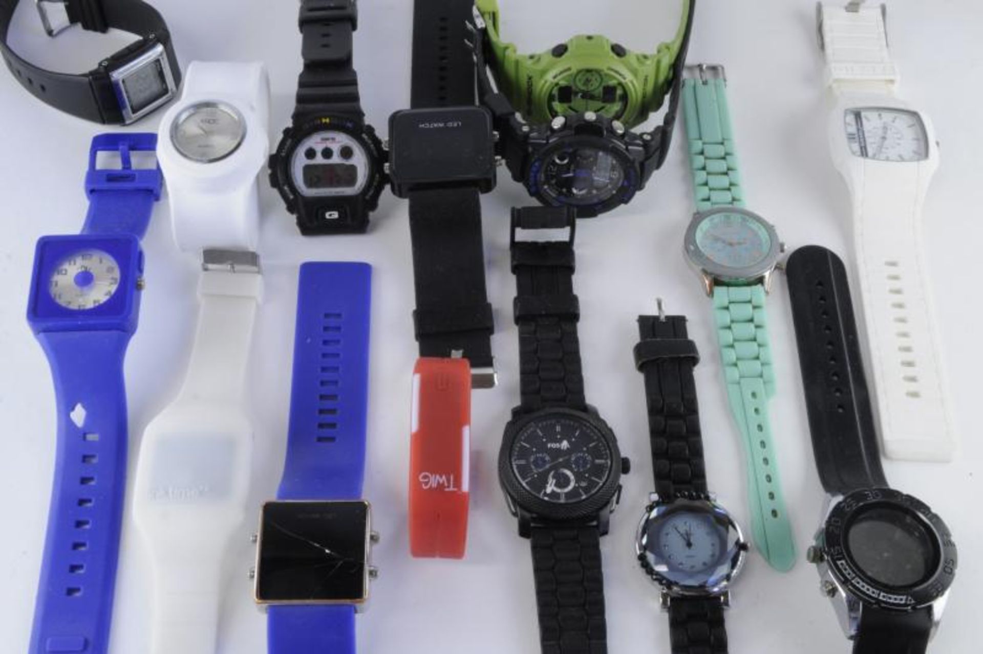 *Approximately fifteen wristwatches, mainly with rubber straps including Fossil (Lot subject to
