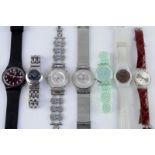 *Bag containing seven ladies' Swatch watches (Lot subject to VAT)