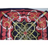 A Hermes "Eperon d'Or" scarf, designed by H d'Origny, twill silk with rolled edges, navy blue