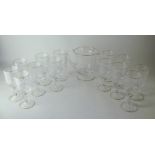 *A Murano Mazzega set of 13 glasses with matching jug and decanter, engraved with stars by M Miotti,