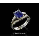Sapphire and diamond ring, rectangular step cut sapphire, estimated weight 1.60cts, with tapered