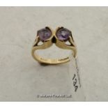 Amethyst two stone dress ring mounted in 9ct yellow gold, ring size K
