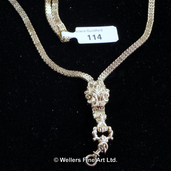 Longuard chain in yellow metal tested as 18ct, terminating with a drop in the design of a hand