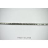 *Diamond set line bracelet, approximately one hundred and sixty baguette cut diamonds channel set in