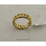 Openwork band ring in yellow metal stamped and tested as 18ct, ring size S