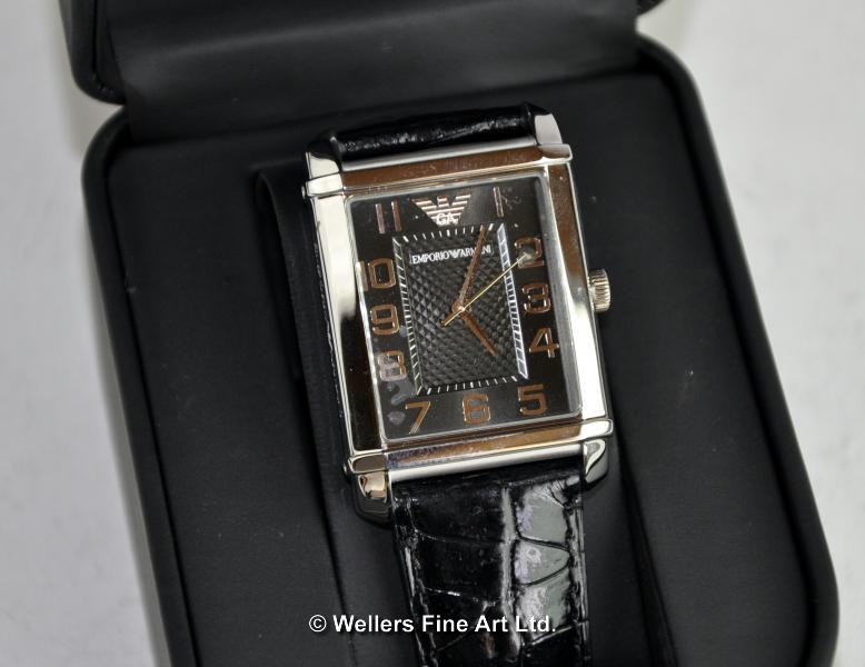 *Emporio Armani wristwatch, black rectangular dial on a black leather strap, boxed (Lot subject to