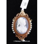 Cameo and pearl brooch/pendant, the oval cameo depicting the profile of a lady, with an ornate