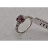 *Ruby and diamond cluster ring mounted in white metal tested as platinum, ring size F½ (Lot