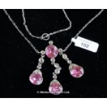 Edwardian pendant necklace, three drops set with round cut pink and white paste stones, mounted in