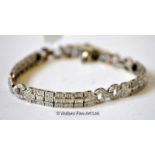 Art Deco style diamond bracelet, set with baguette cut and round brilliant cut diamonds, mounted