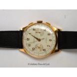 Swiss 18ct cronograph wristwatch, circular cream dial with Arabic numerals and two subsidiary dials,