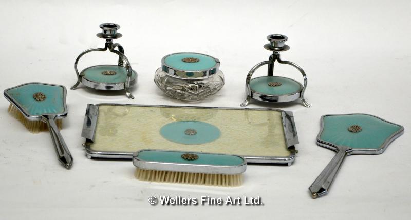 A 1950s retro dressing table set in pale blue and chrome finish, comprising pair of candlesticks,