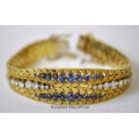 Sapphire and diamond fancy link bracelet, set with twenty-two graduated round cut sapphires and