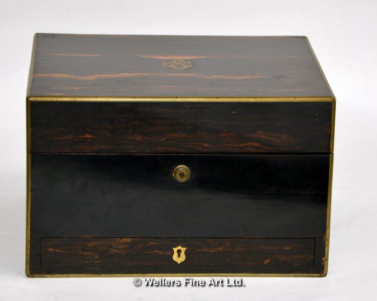 A coromandel brass bound dressing box, with internal mirror, secret leather and moire lined