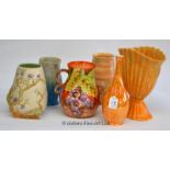 A Clarice Cliff Newport Pottery branch form baluster vase; three 1930's Beswick vases; a Carltonware