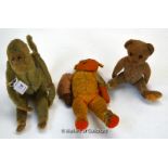 A jointed straw stuffed monkey and two old teddies.
