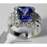 Tanzanite and diamond ring, fancy cushion cut tanzanite weighing an estimated 6.75cts, with a
