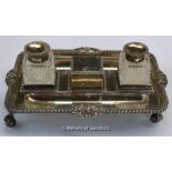 A silver desk stand with two cut glass inkwells, London 1902, 710g weighable silver.