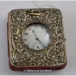 Record Dreadnought steel cased pocket watch and Victorian silver pocket watch stand with repousse