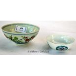 Two Chinese tea bowls, the larger with inset red dot to interior, 11.5cm. (2)