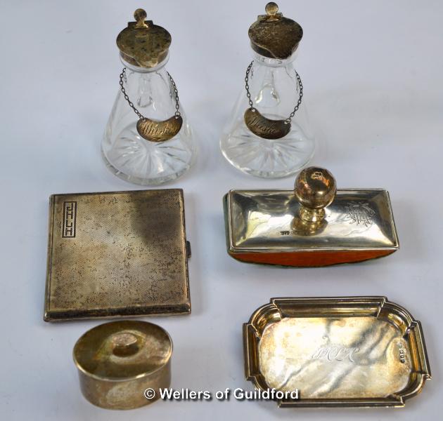 Silver: oval box and cover, Birmingham 1912; roller blotter, Birmingham 1905; pin tray (