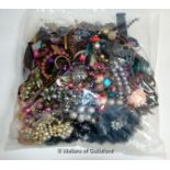 Sealed bag containing costume jewellery, weighing approximately 2.85 kilograms
