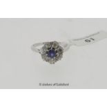 Sapphire and diamond cluster ring, central round cut sapphire with a surround of old cut diamonds,